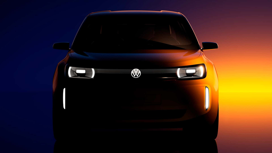 Volkswagen ID EVERY1 teaser przod reflektory na ciemnym tle z gradientem